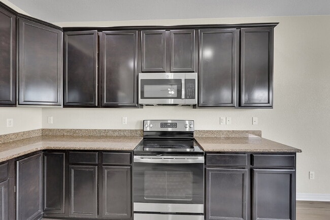 Building Photo - $2,750.00 - 6 Bedrooms, 3.5 Bathrooms, Single Family Home in Colorado Springs with Fenced Yard!