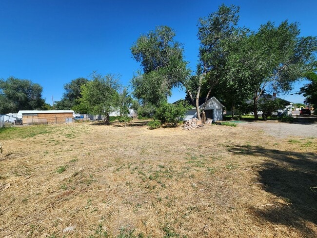 Building Photo - Three Bedroom Home; 1,800 sq ft, 2 car Garage