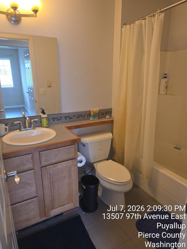 Building Photo - Trio Residences Puyallup condo - 2 bedroom, 2 bathroom with 2 car garage located in gated communi...