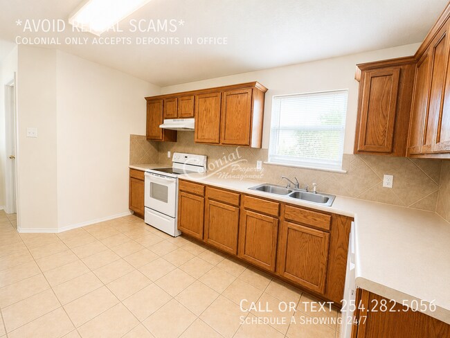 Building Photo - 5406 Boot Scootin Ct