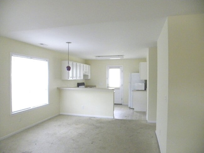 Building Photo - Coming Soon! Students welcome! 3 BR House with rocking chair front Porch. Close to UNCW