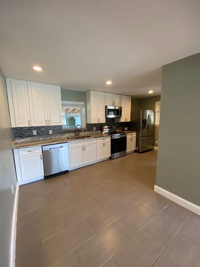 Building Photo - Charming Ranch-Style Home with Finished Ba...