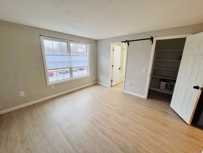 Building Photo - Price Improvement! $1500 Hot Water Included | Looking for the perfect studio in Dover with a pool...