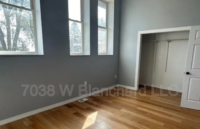 Building Photo - 7038 W Blanchard Rd