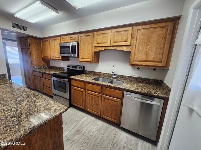 Building Photo - 3136 W Port Au Prince Ln