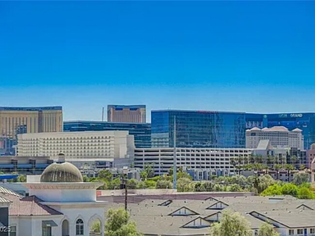 Building Photo - Enjoy resort-style living in this 2 Bed 2 Bath Condo with Stunning Strip Views in the Wimbledon C...