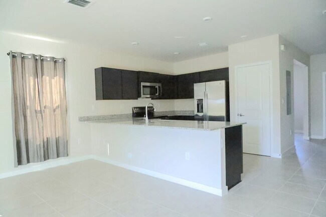 Building Photo - Northwest 10th Court, Florida City, FL 33034 - 3 BR 2.5 BA townhouse