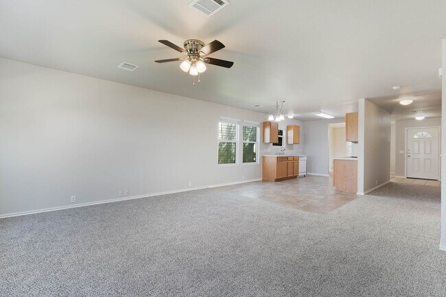 Building Photo - Rare 5 Bedroom Home Available for Immediate Move In w/downstairs Master Bedroom