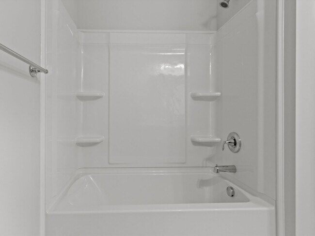 Building Photo - 3 Car Garage! Modern end-unit townhome located in the desirable Clift Farm!