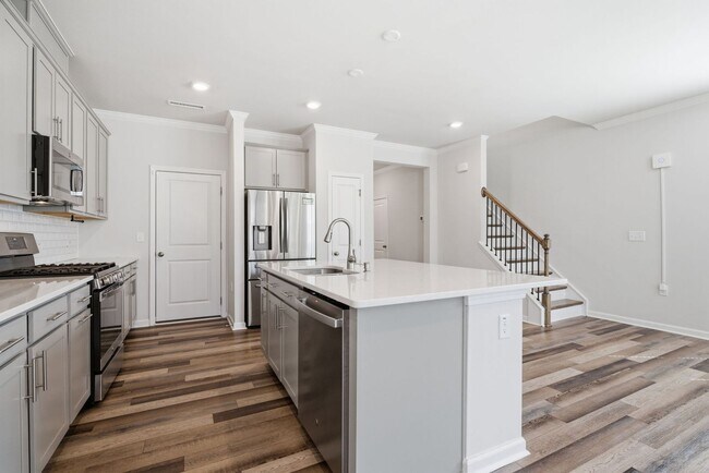 Building Photo - Upgraded 3BR Townhome in Wake Forest | Open Layout, Garage & Resort-Style Amenities