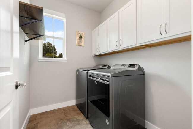 Building Photo - Beautiful River Trail 3 Bedroom Craftsman with Designer Kitchen & Spa-Inspired Primary Suite