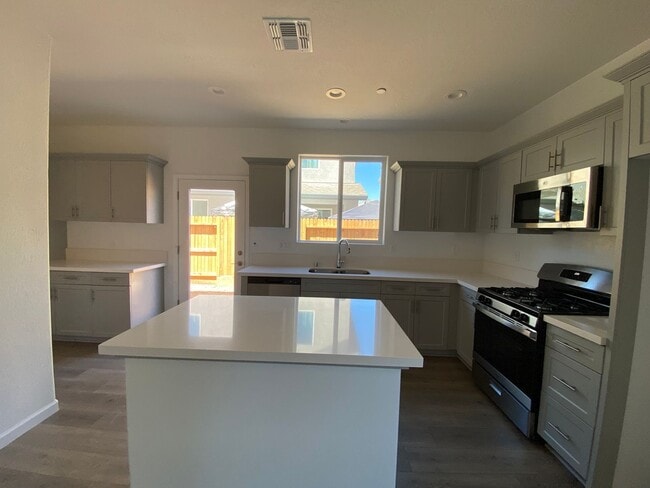 Building Photo - Be the First to Live in This Stunning New ...