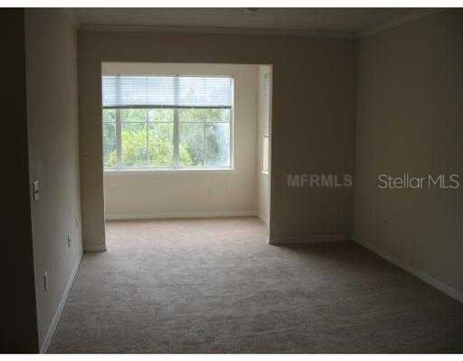 Building Photo - Very nice 2bed/1bath condo on 2nd floor in gated Enclave at Richmond place in New Tampa!