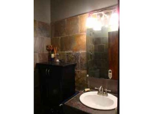 slate tile bathroom - 1107 S Peters St