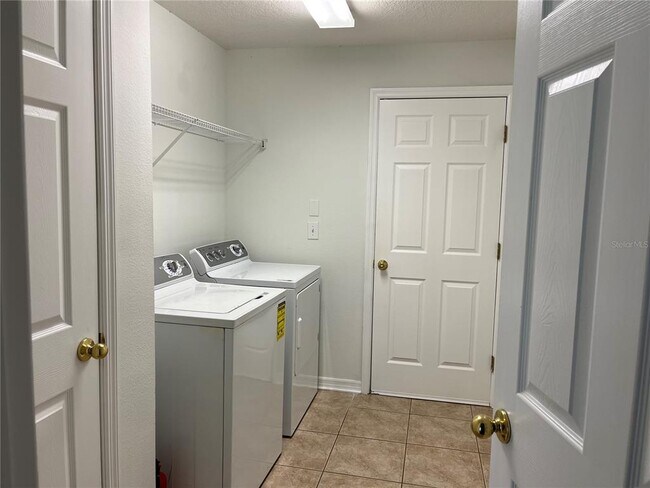 Building Photo - 5909 Sweet William Terrace