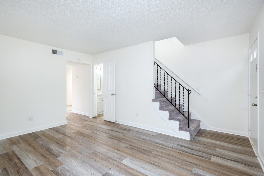 living room (banister being replaced) - 597 Huntington Pky