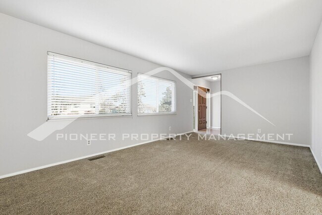 Building Photo - Spacious Home with 2 Car Garage and Fenced in Backyard!