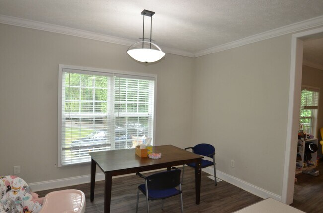 Building Photo - Modern Chapel Hill Retreat with Designer Finishes & Spacious Outdoor Living