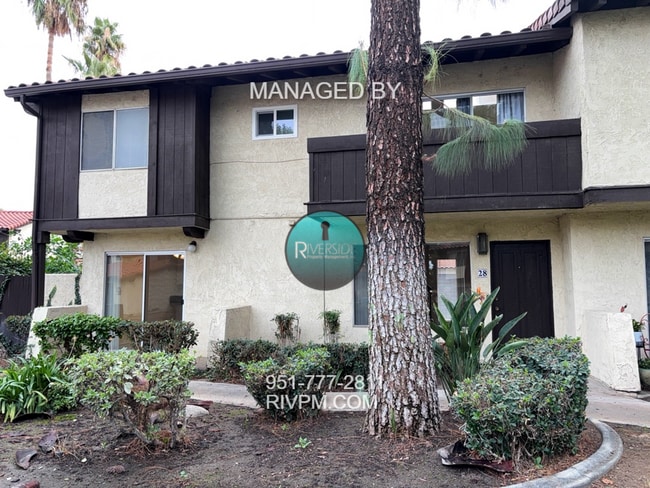 Building Photo - DISCOVER YOUR DREAM CONDO IN COLTON!!!