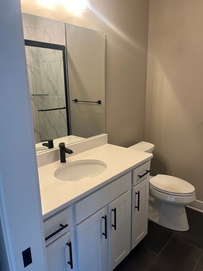 Building Photo - New Construction, 2 bed, 3 bath Row Home, with 2 car garage, fireplace, and rooftop deck!