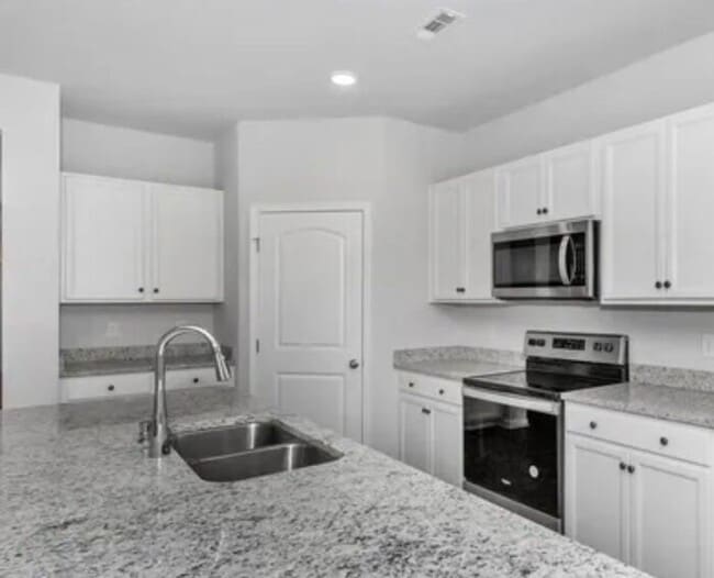 Building Photo - Coming in May with a FENCED YARD