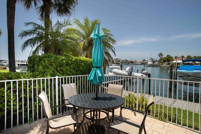 Building Photo - Tierra Verde WATERFRONT Annual Unfurn. 3BR 3BA 2 Car Tandem Garage Townhome w/SLIP