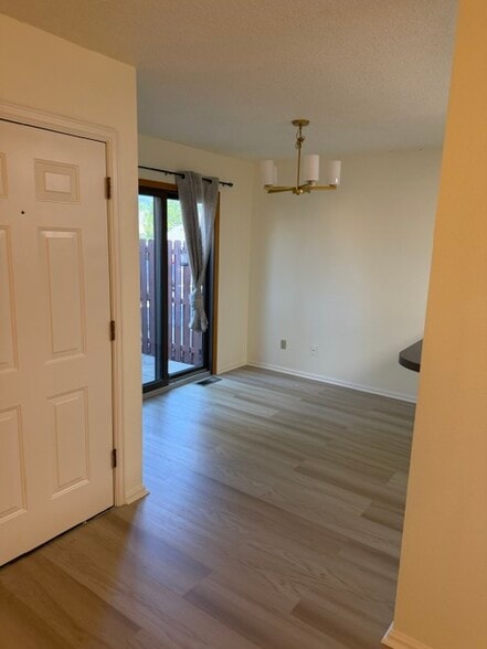 Dining Area with New Lighting and Private Patio - 18294 W 58th Pl