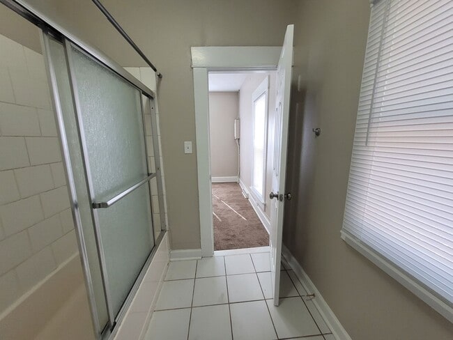 Building Photo - Two bedroom home with partially fenced yard!