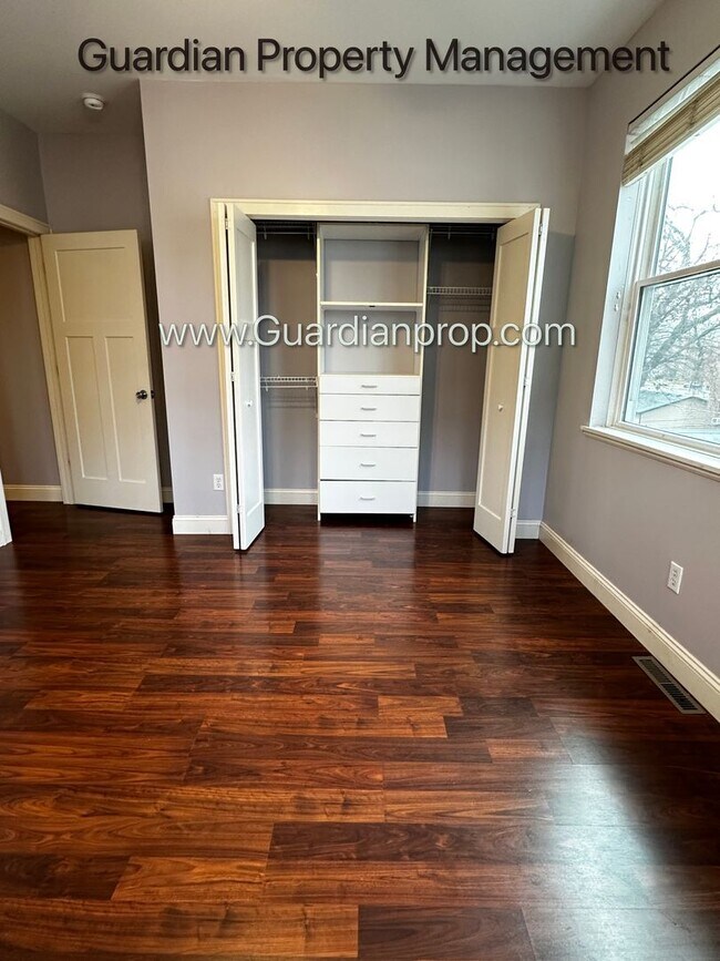 Building Photo - Spacious Uptown Side By Side, Dishwasher, Garage, In Unit Laundry, Private Rooftop Deck