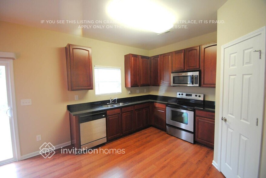 Building Photo - 8003 Blue Stream Ln