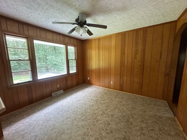 Building Photo - Spacious brick house with a caport and unf...
