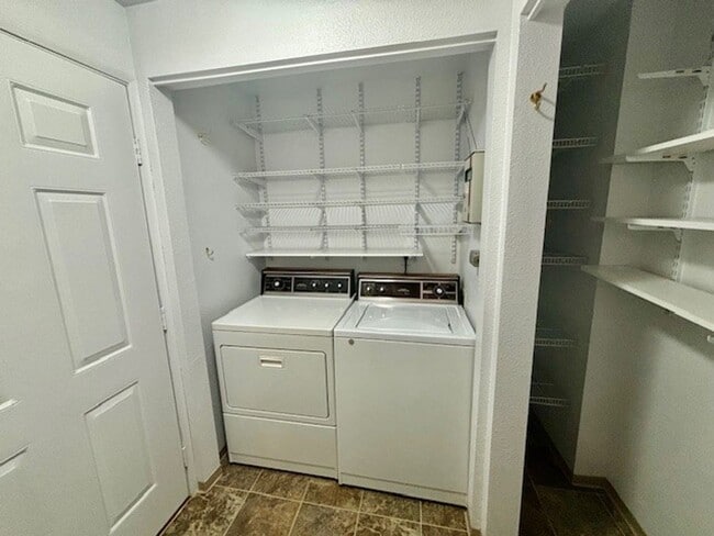 Building Photo - DES MOINES CONDO WITH PEEK-A-BOO SOUND VIEWS & PRIVATE GARAGE!