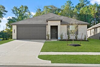 Building Photo - "Charming 4-Bed Sanctuary with Granite Elegance in Magnolia!"