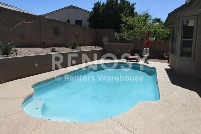 Building Photo - 4 BD + Office, 2.5 BA. 3-Car Garage w/ Pool in Litchfield Park!