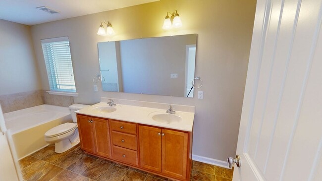 Building Photo - Stylish Two-Story in the dreamy Riverbrook...