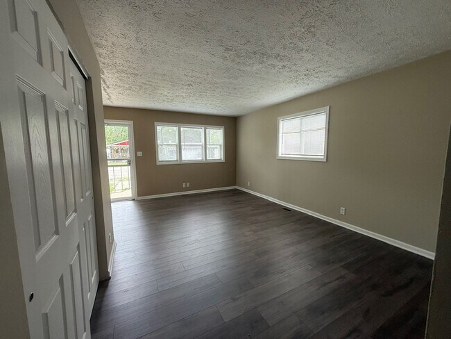 Building Photo - Newly rehab, three bedroom, one bath and Christian Park with a fence yard.