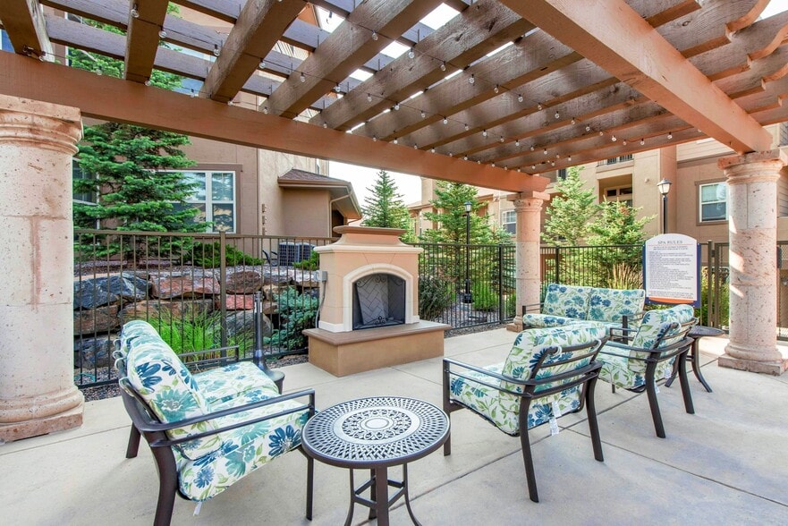 Outdoor fireplace and seating - Talon Hill