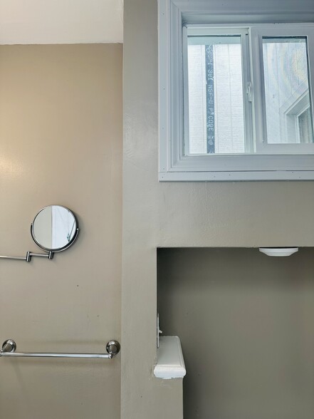 lightwell and vanity in bathroom - 245 Concord St