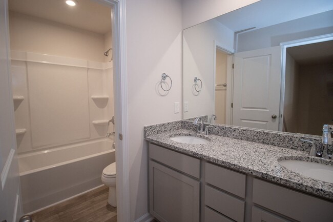 Building Photo - Spacious 4-Bedroom Home - Convenient to Fo...