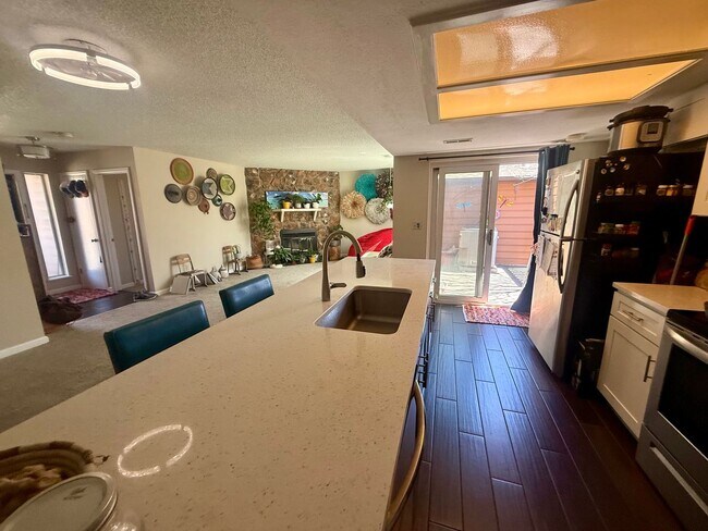 Building Photo - Spacious, Sunlit 3BR / 2 BA Condo just steps away from Standley Lake!