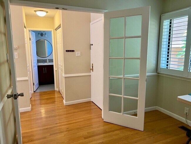 Building Photo - Great Natural light, Treetop Views with 2 Primary Suites plus OFFICE and a 2 car garage, It is li...