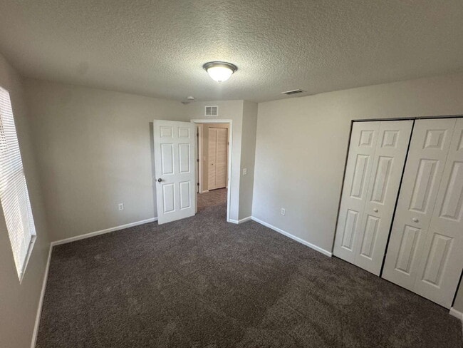 Building Photo - "Spacious 4-Bedroom Home with 2 Full Baths...