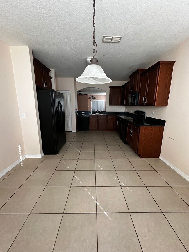 Building Photo - 3909 Flowering Orchid Ln