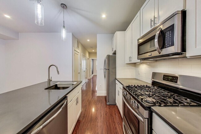 Building Photo - Welcome to Unit 202 at the Arboretum Condo...