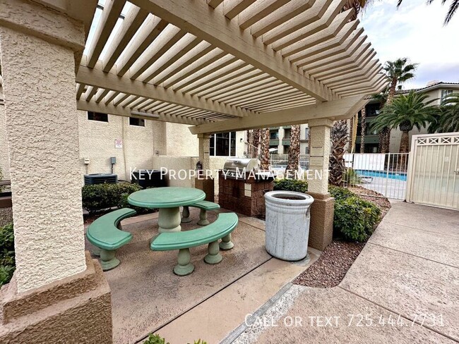 Building Photo - FULLY FURNISHED 1 BEDROOM CONDO IN GATED C...