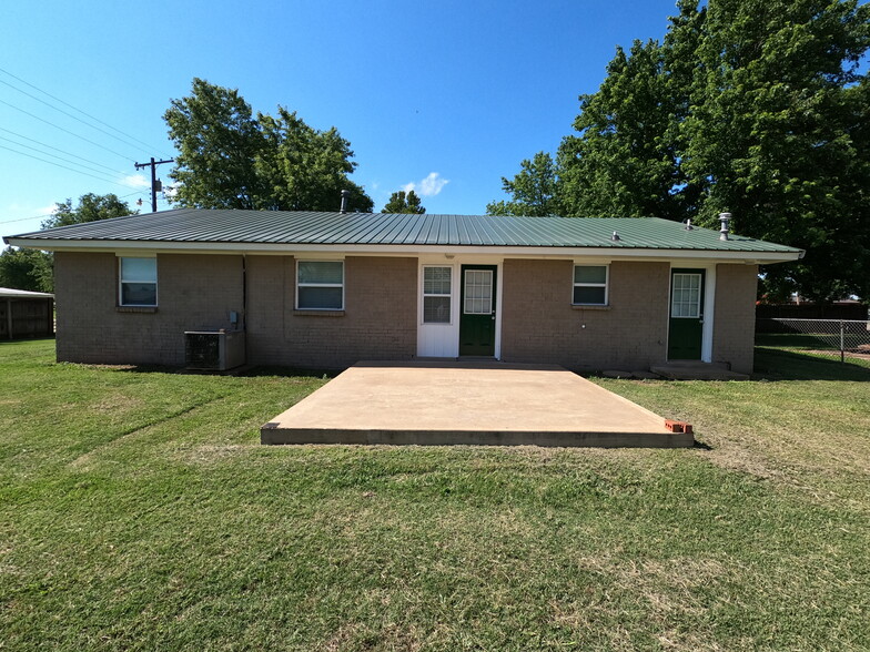 View of back of house with large back porch - great for cookouts and get-togethers - 415 W Guthrie St