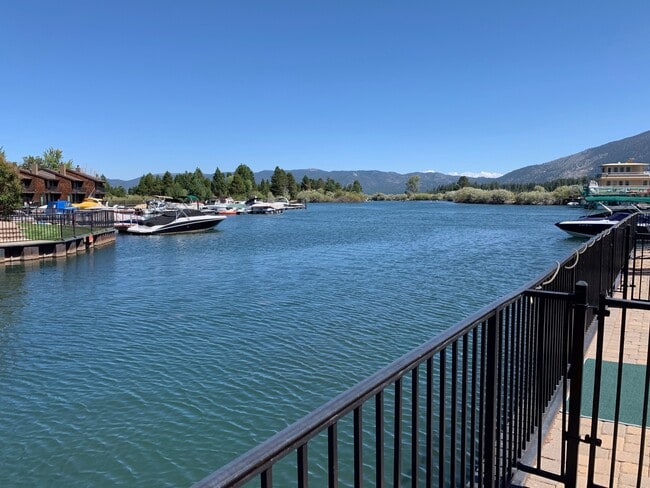 Building Photo - Secure your boat dock before summer!  Unfurnished 3 bed, 2 bath condo with marina and mountain vi...