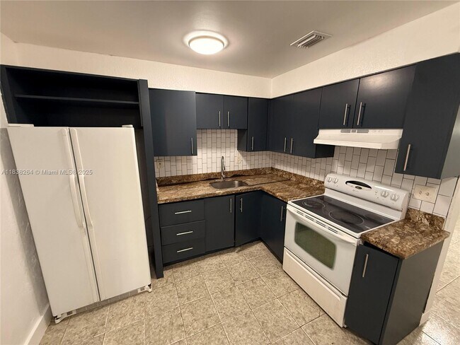 Building Photo - 1101 NW 55th Ave