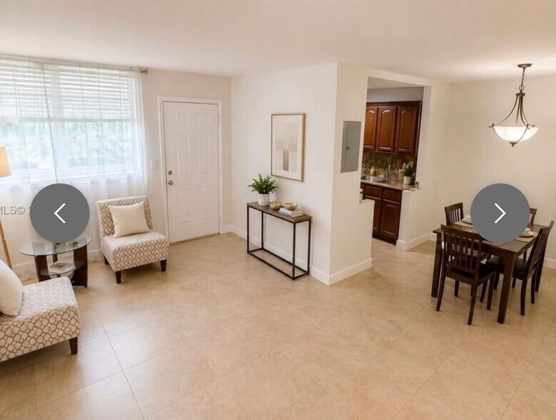 Living, dining and partial kitchen view - 12590 NE 16th Ave
