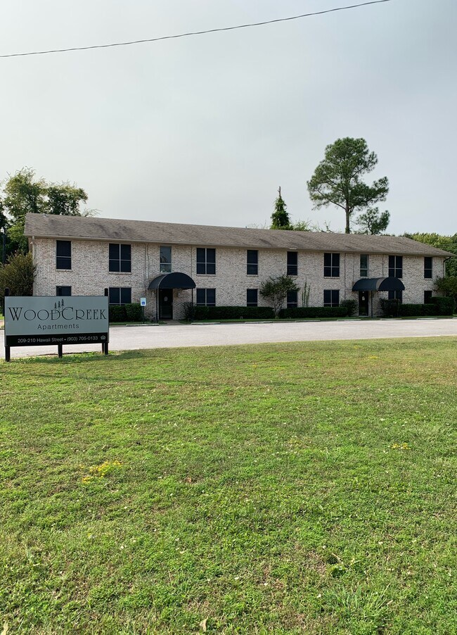 Building Photo - WoodCreek Apartments